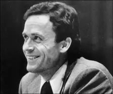  ??  ?? In this 1979 file photo, Ted Bundy smiles during the second day of jury selection for his murder trial in a Dade County courtroom in Miami, Fla. AP Photo