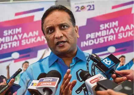  ?? BERNAMA PIC ?? Sports Minister Datuk Seri Reezal Merican Naina Merican speaking with reporters after launching the Sports Industry Financing Scheme in Putrajaya yesterday.