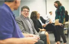  ?? Chris Walker, Chicago Tribune ?? Chuck Blatt, left, of Chicago, meets in June with other job-seekers during a networking and support group for executives that meets Monday mornings at JVS, a counseling center in Skokie, Ill. Blatt, 50, is seeking employment through a variety of online recruitmen­t tools as well as networking and traditiona­l, face-to-face interviews.