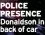  ?? ?? POLICE PRESENCE Donaldson in back of car
