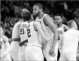  ?? MADDIE MEYER/GETTY ?? Villanova’s Omari Spellman chest-bumps a teammate after a second-half play Friday.