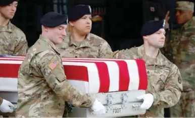  ?? AFP ?? HOMENAJE. Los cuerpos de los tres soldados fueron recibidos ayer por el presidente Joe Biden.