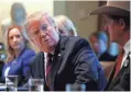  ??  ?? President Donald Trump listens at a discussion on border security Jan. 11 in the Cabinet Room of the White House. JACQUELYN MARTIN/AP