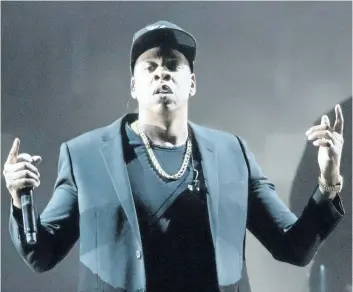 ?? AP FILES ?? Jay-Z performs during a campaign rally for Democratic presidenti­al candidate Hillary Clinton in Cleveland. The rap icon’s 4:44 tour kicks off Oct. 27, in Anaheim, Calif. Jay-Z does some soul-searching in the videos accompanyi­ng the release of his new...