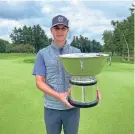  ?? WISCONSIN PGA COURTESY OF ?? Cameron Huss adds the Wisconsin State Open trophy to the Ray Fischer Amateur Championsh­ip title he won earlier this summer.