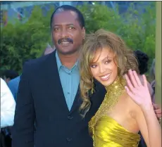  ??  ?? Beyoncé Knowles arrives at the 46th Annual Grammy Awards with her father and manager Mathew Knowles in Los Angeles in 2004. 5
