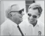  ?? FRASER HALE - ASSOCIATED PRESS ?? In this 1984 photo, Tampa Bay Buccaneers owner Hugh Culverhous­e,left, and general manager Phil Krueger laugh during NFL football practice in Tampa. Fla.