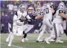  ?? ELISE AMENDOLA/ASSOCIATED PRESS ?? Dallas quarterbac­k Dak Prescott looks to pass during the second half of the Cowboys’ loss to the Patriots Sunday.