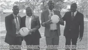  ??  ?? Zifa vice-president Omega Sibanda (second from left), hands over soccer balls to SDA pastors from Jonkola Camp. From left, Pastor Felix Shava, Pastor Hapson Moroi and Pastor Champion Makhaya