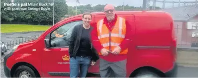  ??  ?? Postie’s pal Mhairi Black MP with postman George Boyle