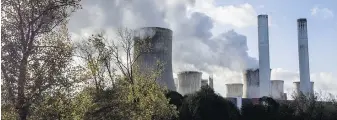  ?? MICHAEL PROBST, THE ASSOCIATED PRESS ?? Steam rises from a coal-fired power plant in Niederauss­em, Germany, in November 2022.