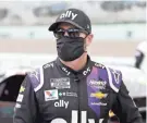  ?? USA TODAY NETWORK ?? NASCAR driver Jimmie Johnson wears a mask before a race last month at Homestead-Miami Speedway.