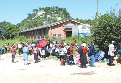  ??  ?? Patients queue to get medical services at Victoria Chitepo Provincial Hospital recently. Health care workers have been tirelessly working on the frontline exposing themselves to the deadly virus.— Picture: Tinai Nyadzayo