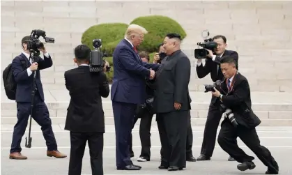  ?? Photograph: Kevin Lamarque/Reuters ?? Trump with Kim in 2019. Trump’s comments contradict his claim that he took no government secrets with him upon leaving the White House.