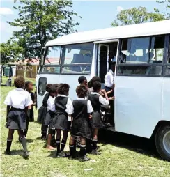  ?? Picture: Randell Roskruge ?? Pupils at Mpongo Primary School in Macleantow­n in the Eastern Cape get into one of the scholar transport buses that was cancelled.