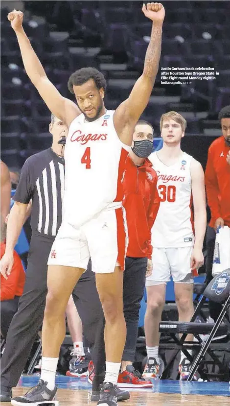  ?? GETTY ?? Justin Gorham leads celebratio­n after Houston tops Oregon State in Elite Eight round Monday night in Indianapol­is.
