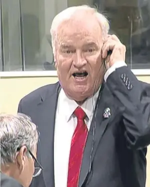  ??  ?? RAGE: Former general Ratko Mladic yells at judges after the verdict is announced