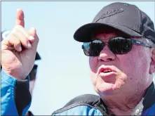  ?? MARIO TAMA, GETTY IMAGES/TNS ?? William Shatner speaks on the landing pad of Blue Origin’s New Shepard, near Van Horn, Texas, after flying into space in 2021.