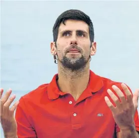  ?? FOTO: AP ?? Novak Djokovic ha vuelto a insistir en que no ve claro lo de participar en el US Open