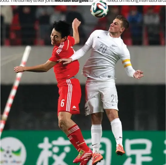  ?? Photo / Photosport ?? Chris Wood became the youngest All Whites skipper against China in 2014 — he had the jersey and arm band from that match framed.