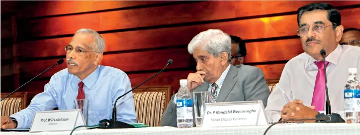  ??  ?? Central Bank Governor Prof. W.D. Lakshman (centre) with other officials at last week's media briefing. The bank's road map for 2020 will be released tomorrow.