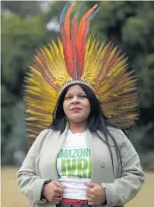  ?? ANDRE PENNER AP file ?? Indigenous leader Sonia Guajajara poses for a photo during a protest against violence, illegal logging, mining and ranching and to demand government protection for her people’s reserves on Sept. 4 in Sao Paulo, Brazil.