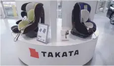  ?? — AFP ?? Car seats are in display at Japanese auto parts maker Takata at a showroom in Tokyo.