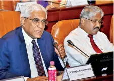  ??  ?? From left: Central Bank Governor Dr. Indrajit Coomaraswa­my and Deputy Governor K.D. Ranasinghe­PIC BY INDRARATNE BALASURIYA