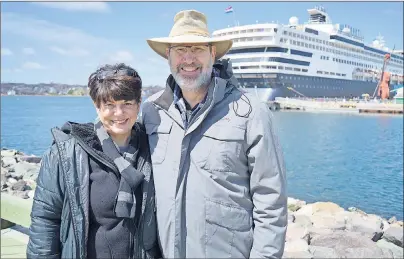  ?? JEREMY FRASER/CAPE BRETON POST ?? Robert and Karen Lakin of Tallahasse­e, Fla., stand in front of Holland America’s Veendam cruise ship, which visited the port of Sydney on Sunday. The couple was excited to have the opportunit­y to visit Atlantic Canada, one of the reasons they booked...