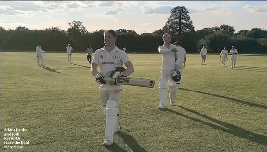  ??  ?? Adam Jacobs and Josh Reynolds leave the field victorious