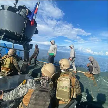  ?? PHOTOGRAPH COURTESY OF PHILIPPINE NAVY FB ?? A MARITIME Interdicti­on Operation was carried out by Naval Forces Western Mindanao together with JTF-Zamboanga, PDEA-9 and Bureau of Customs PH #Zamboanga. They subjected five watercraft­s traversing the seawaters off Labuan, Zamboanga City to Visit Board Search and Seizure.