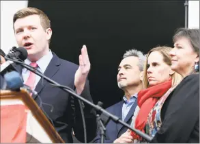  ?? Arnold Gold / Hearst Connecticu­t Media ?? State Rep. Sean Scanlon, left, speaks at a news conference about gun safety in November, following the death of Ethan Song. From left are Scanlon, Ethan’s parents, Michael and Kristin Song, and the Rev. Ginger Brasher-Cunningham.