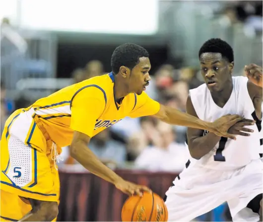  ?? MICHELLE LAVIGNE/FOR THE SUN-TIMES ?? Jaylon Tate (Illinois) was among five seniors on Simeon’s 2013 championsh­ip team who played high-level college basketball.