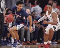  ?? Michael Hickey / Getty Images ?? UConn sophomore Jalen Gaffney, left, is eager to show his explosiven­ess and overall athleticis­m this season after a high ankle sprain slowed him a bit as a freshman.