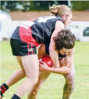  ??  ?? Nilma-Darnum’s Jack Ruddell makes the tackle on Catani’s Riley McDonald.