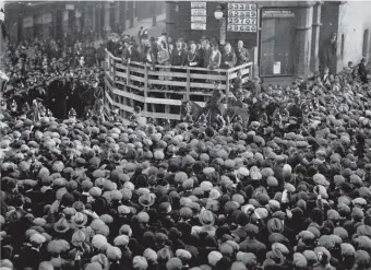  ??  ?? The election declaratio­n outside Victoria Hall in 1931.