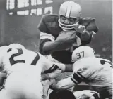  ?? AP ?? Browns star Jim Brown sails over the line for a fourth-quarter touchdown against the Pittsburgh Steelers on Oct. 2, 1960, in Cleveland.