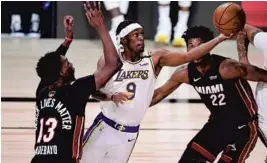  ?? DOUGLAS P. DEFELICE/GETTY ?? Rajon Rondo of the Los Angeles Lakers drives to the basket against Jimmy Butler on Sunday.