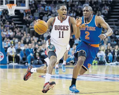  ??  ?? The Bucks’ Brandon Knight, left, drives against the Knicks.