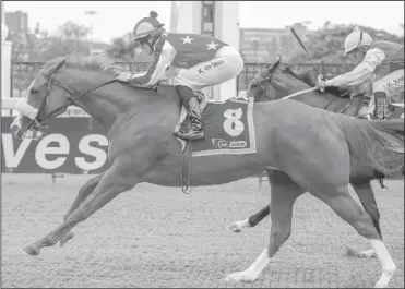  ?? Picture: Candiese Marnewick ?? MISS FRANKEL, with Keagan de Melo up, wins the Delpech Family Race FM 87 Handicap for trainer Dennis Drier at Greyville yesterday.