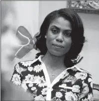  ?? The Associated Press ?? ROOSEVELT ROOM: In this Feb. 14, 2017, file photo, Omarosa Manigault Newman, then the director of communicat­ions for the White House Office of Public Liaison, watches during a meeting with parents and teachers in the Roosevelt Room of the White House in Washington. Manigault Newman said Sunday she secretly recorded conversati­ons she had in the White House, including her firing by chief of staff John Kelly in the high-security Situation Room.