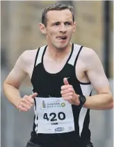  ??  ?? Liam Taylor, third in the 5k last night.