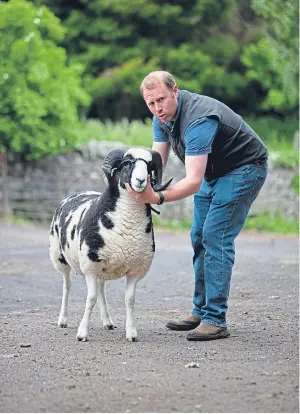  ??  ?? CONTENDER: Mike Munro with Beiliau Maserati ahead of the the Highland Show