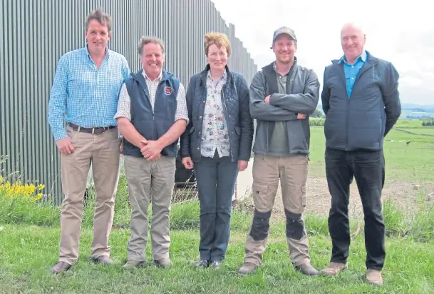  ??  ?? STEAKING A CLAIM: From left, SBA vice-chairman David Barron, host farmers Robbie, Barbara and James Milne, and SBA chairman Neil McCorkinda­le