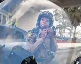  ??  ?? Florida Highway Patrol trooper Chantale Jones is the only female member out of 50 in her motorcycle unit.