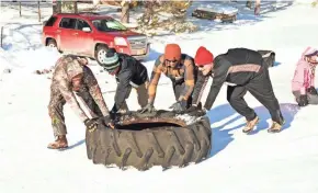  ?? DEVON LLOYD ?? Competitor­s complete an obstacle during the Arctic Warrior Race in St. Germain. This year’s event is set for Jan. 13.