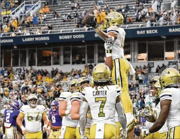  ?? HYOSUB SHIN/HYOSUB.SHIN@AJC.COM ?? Georgia Tech running back Dontae Smith (celebratin­g a touchdown against Western Carolina) says of name, image and likeness deals: “At the end of the day, it’s income to you, so why not take it?”