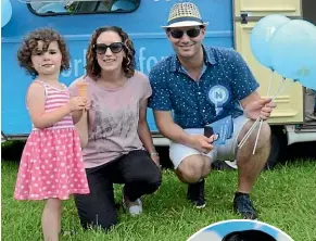  ??  ?? National Party leader Simon Bridges, right, and MP Jami-Lee Ross and family, above. The two politician­s have had a major falling-out.