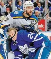  ?? RICK MADONIK TORSTAR FILE PHOTO ?? One-time Niagara IceDog Alex Pietrangel­o, top, had 52 points in 70 games for St. Louis in 2019-20.