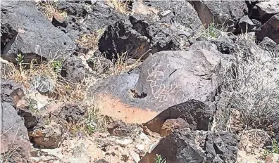  ?? ?? Visitors to Petroglyph National Monument can see many lovely or intriguing rock carvings.